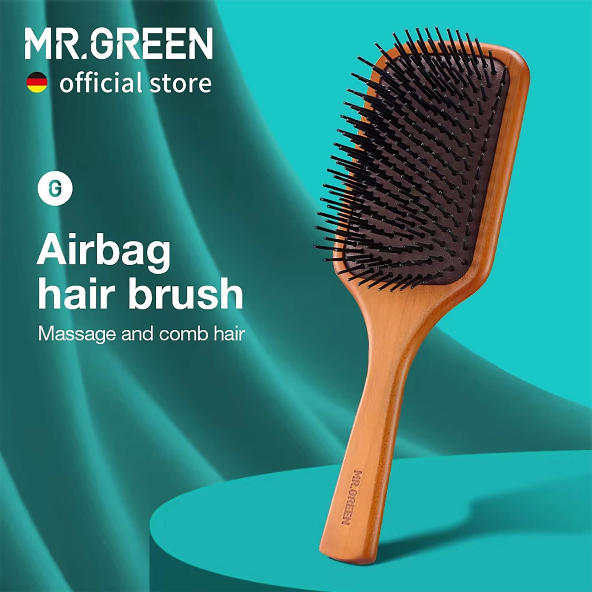 Close-up of MR.GREEN paddle brush high-elastic air-cushion pad and dome pins, anti-static detangling on wet or dry hair.
