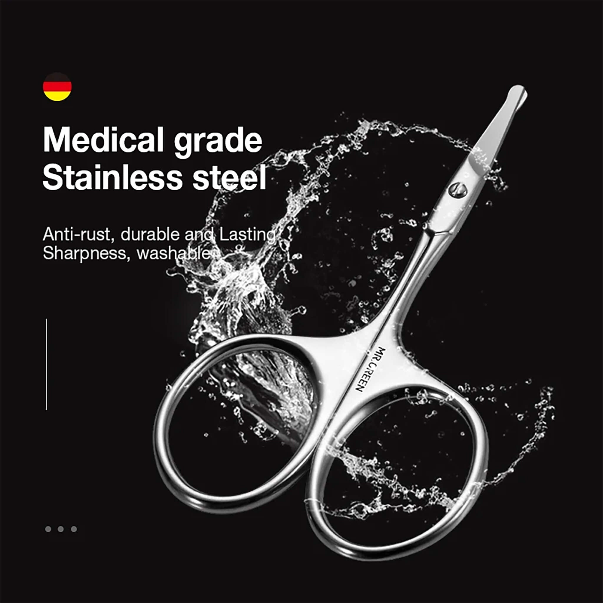 Forbicine MR.GREEN in acciaio inox grado medicale con punte arrotondate, antiruggine e lavabili; splash d’acqua su sfondo nero.