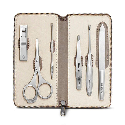 MR.GREEN MR-760i luxury manicure set, main image — open leather zip case with stainless-steel clipper, scissors, tweezers and nail file.
